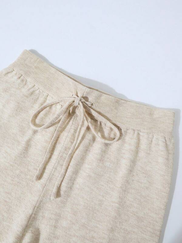 Conjunto Tricô Com Cardigan Cropped E Calça Pantalona
