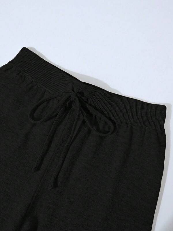 Conjunto Tricô Com Cardigan Cropped E Calça Pantalona