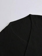 Conjunto Tricô Transpassado Com Calça Flare E Cinto Decorativo