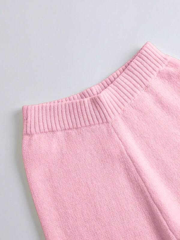 Conjunto Tricô Transpassado Com Calça Flare E Cinto Decorativo