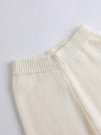 Conjunto Tricô Transpassado Com Calça Flare E Cinto Decorativo